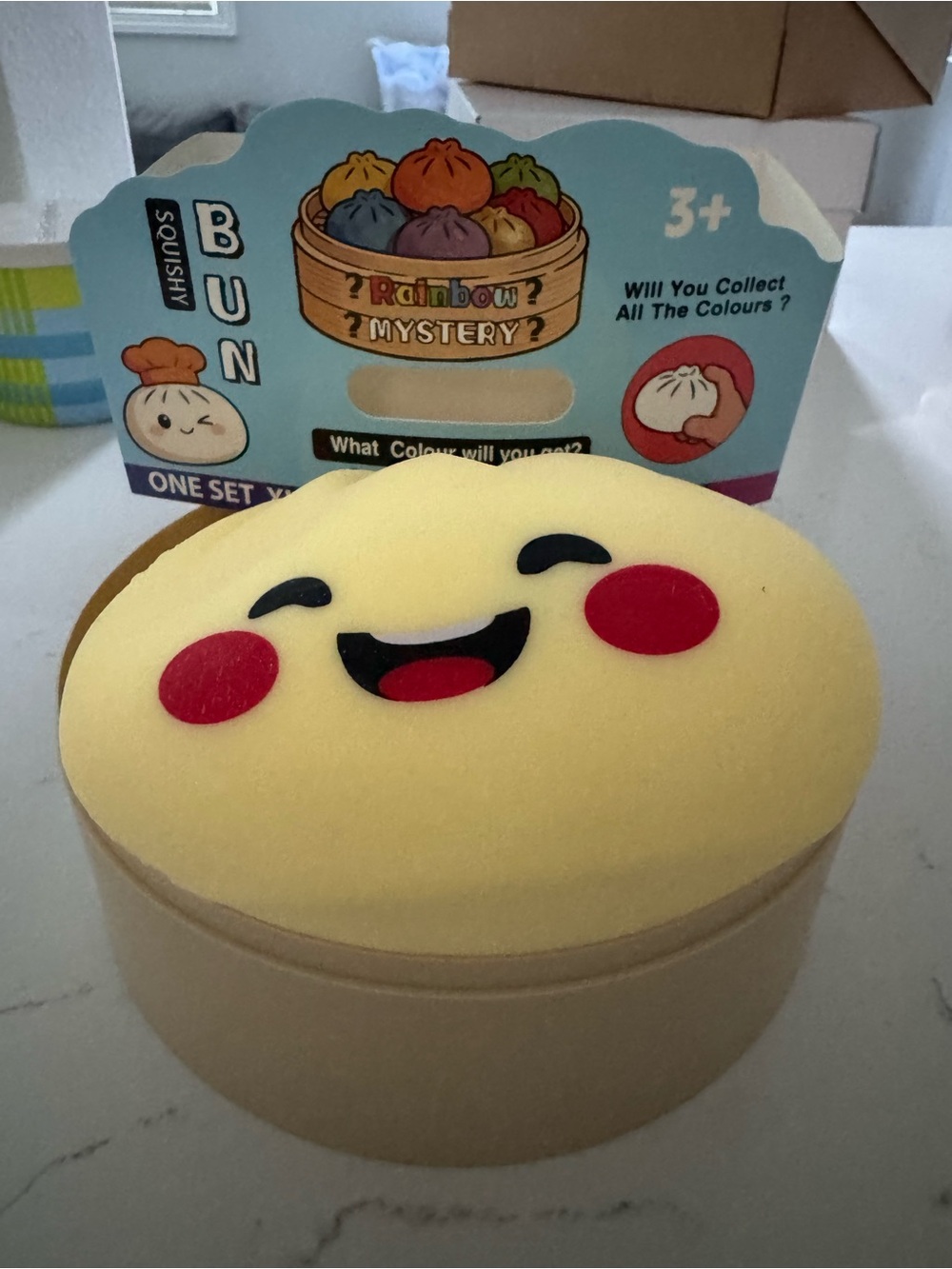 Squishy Bun Rainbow Mystery Yellow Smiling Bun